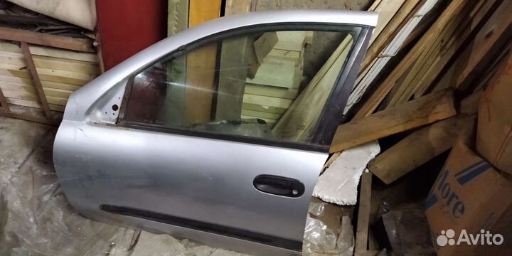 Двери левая сторона almera n16