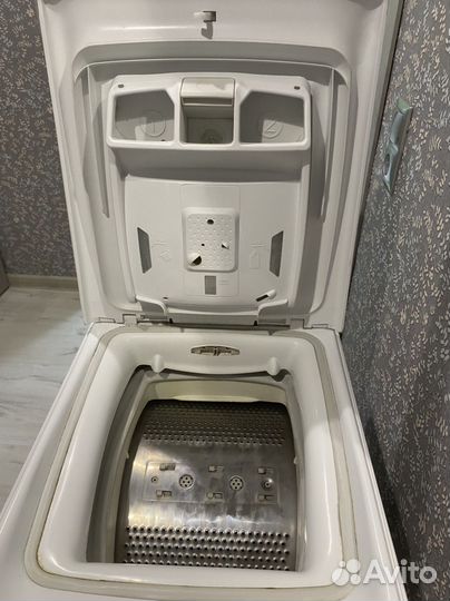 Стиральная машина Candy с вертикальной загрузкой