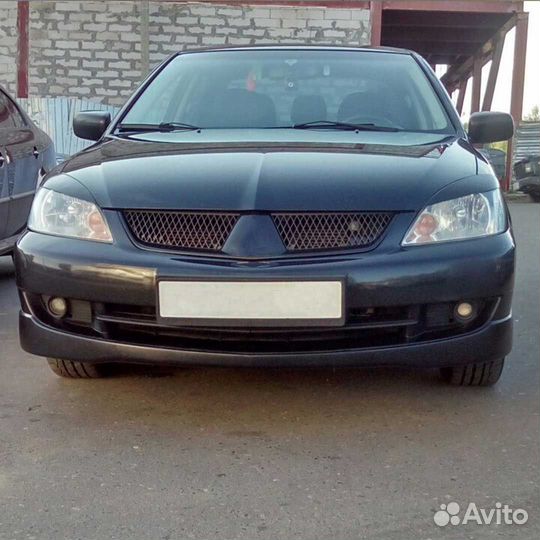 Юбка переднего бампера 2.0 Митцубиси Лансер 9