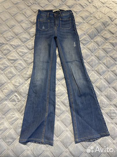 Джинсы клеш женские