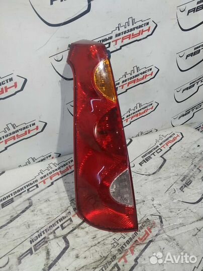 Фонарь nissan note E11 NE11 ZE11 22063780 левый 26