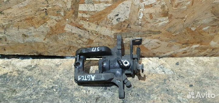 Суппорт задний правый Opel Astra J GTC 2012-2017