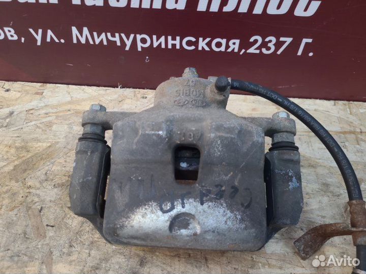 Суппорт тормозной передний левый Kia Ceed JD