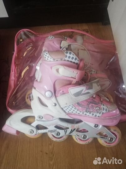 Роликовые коньки