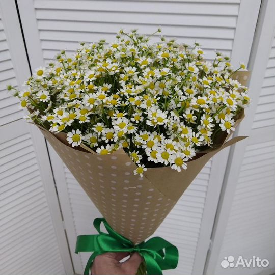 Букет ромашек в оформлении