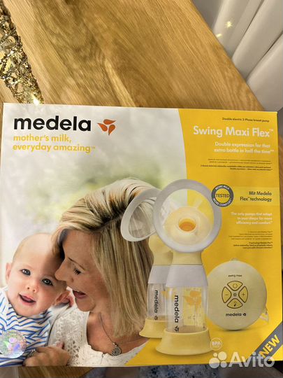 Молокоотсос medela swing maxi flex электрический