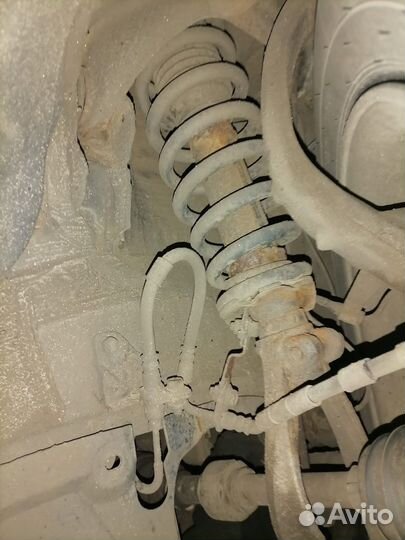 Стойка амортизатора передняя левая mazda 6