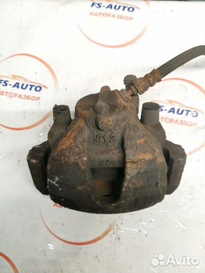 Суппорт тормозной передний левый Mazda 3 седан BK