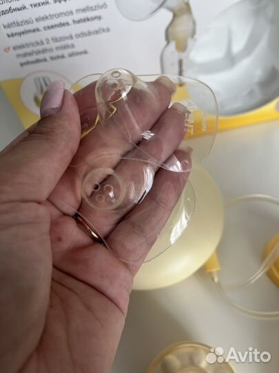 Молокоотсос medela электрический