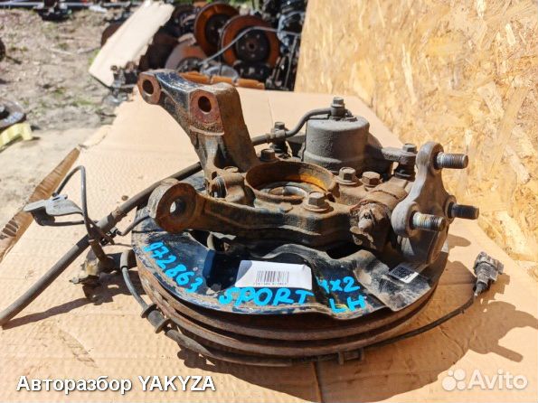 Кулак Киа Спортейдж 4 левый поворотный