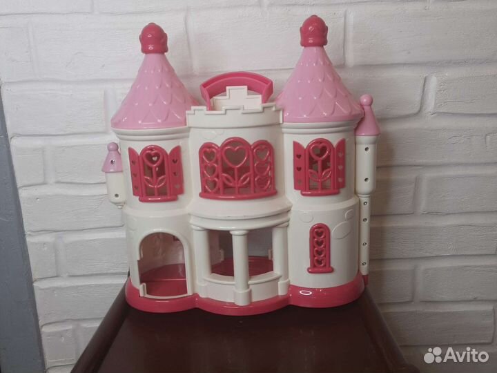Игрушечный домик раскладывается