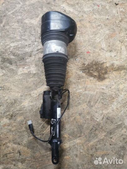 Стойка амортизатора передняя левая Bmw 7-Series