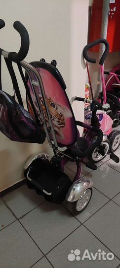 Трехколесный велосипед с ручкой