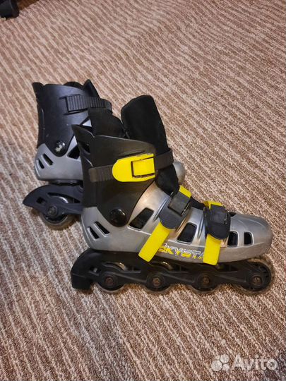 Роликовые коньки