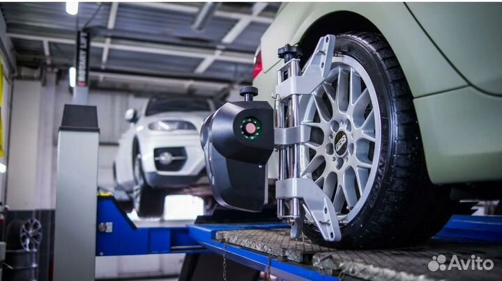 Автослесарь сход-развала