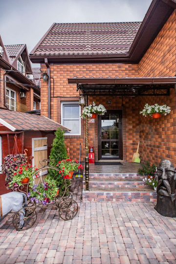 Коттедж 1000 м² на участке 14 сот.