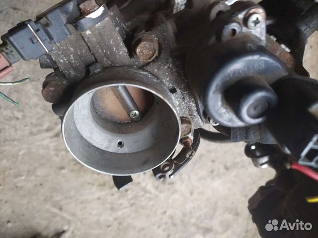 Заслонка дроссельная Мицубиси Лансер 8