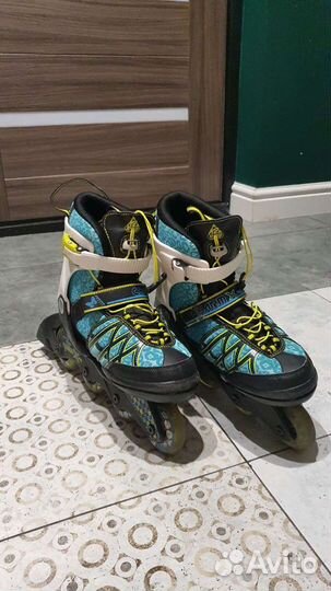 Роликовые коньки