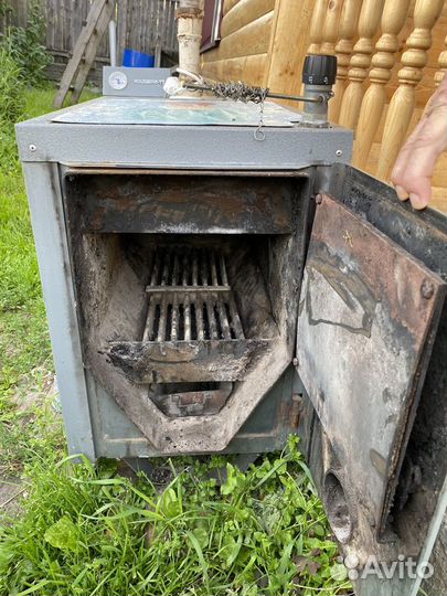 Котел отопления твердотопливный