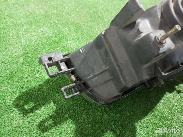 Фара галогеновая левая Toyota Corolla AE91