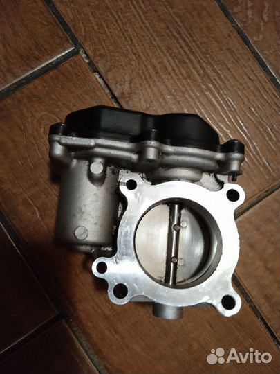 Тросельная заслонка