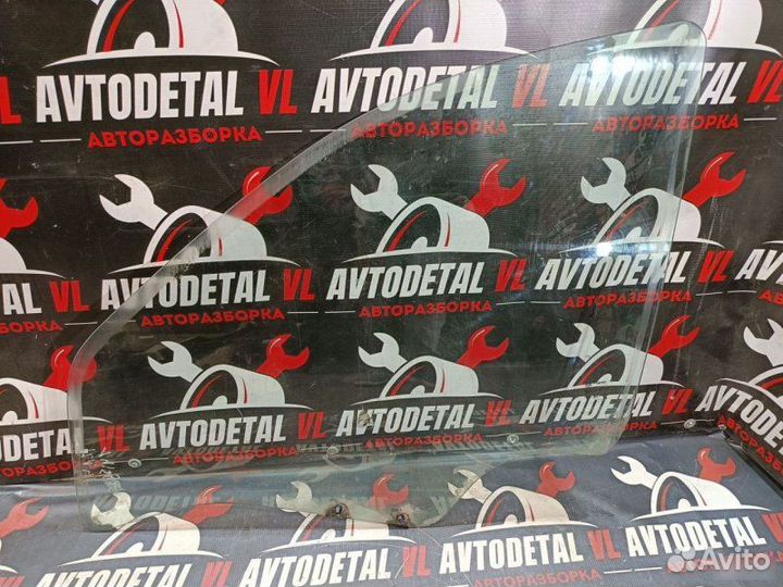 Стекло двери переднее левое Renault Logan седан