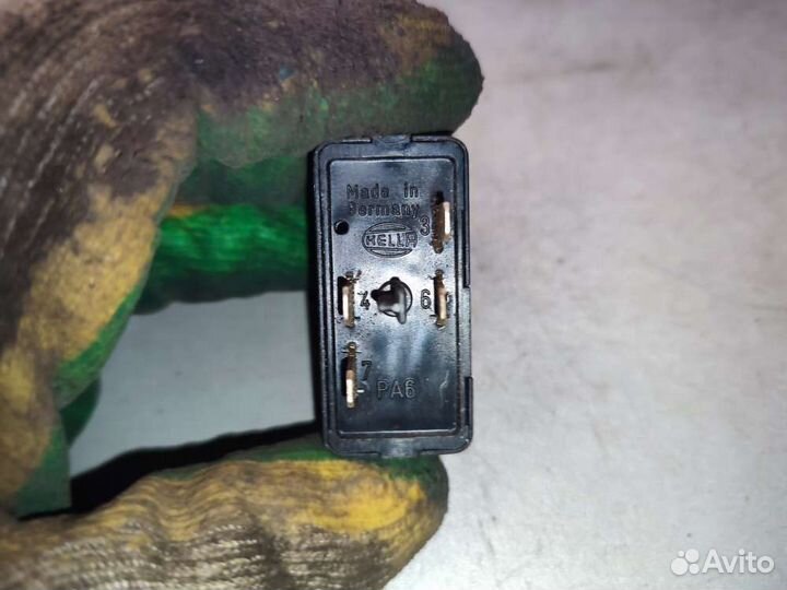 Кнопка корректора фар на Opel Astra F