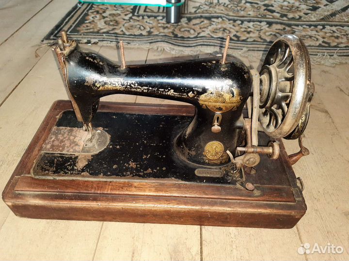 Швейная машинка Зингер