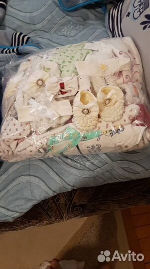 Кокон и вещи для новорожденных