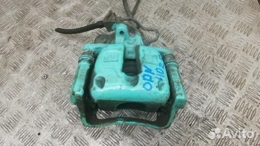 Суппорт тормозной задний правый volkswagen passat