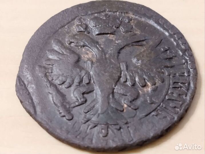 Монета Денга