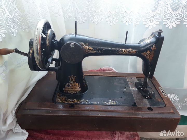 Старинная швейная машинка singer