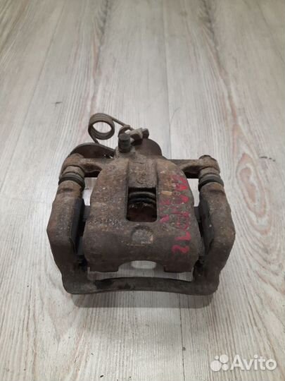 Суппорт тормозной задний Hyundai solaris Лев