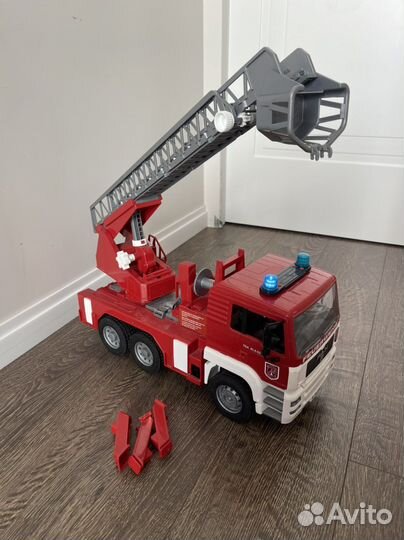 Машина пожарная Bruder MAN звук свет