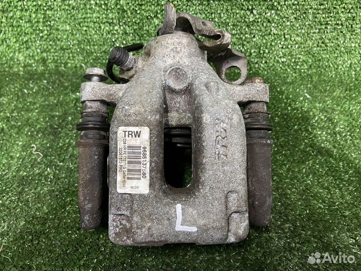 Суппорт тормозной задний левый Peugeot 308