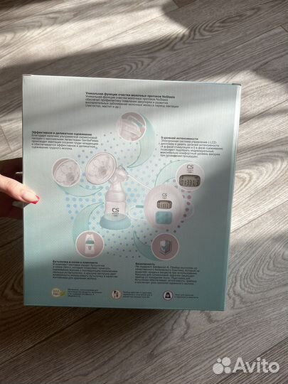 Молокоотсос электрический новый