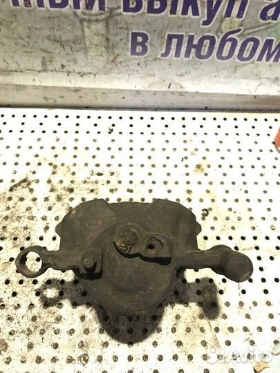 Суппорт передний левый Mazda 6GG 2.0