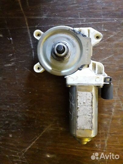 Моторчик стеклоподъемника Ford Focus I