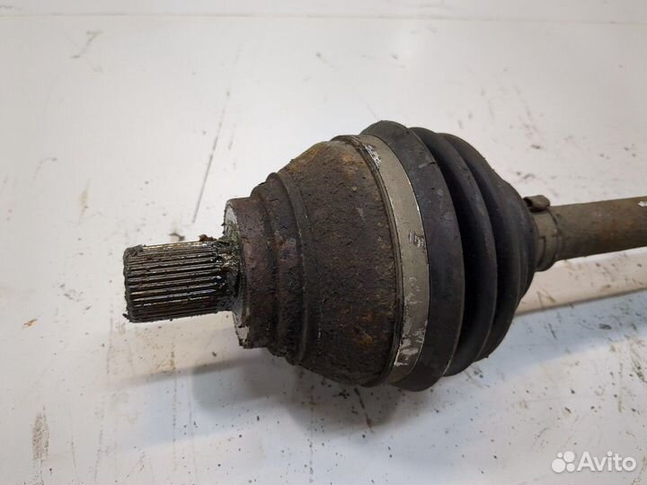 Полуось левая передняя Volkswagen Caddy