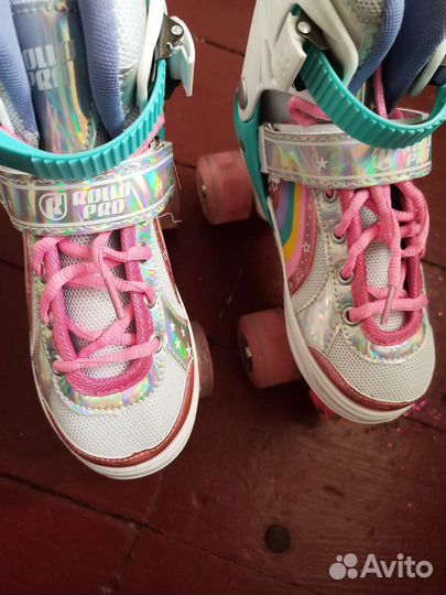 Роликовые коньки