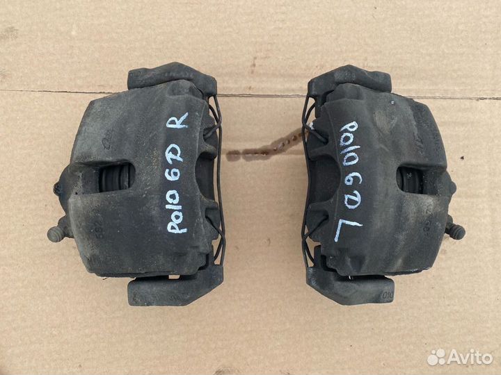 Суппорт тормозной передний Volkswagen Polo 5 sedan