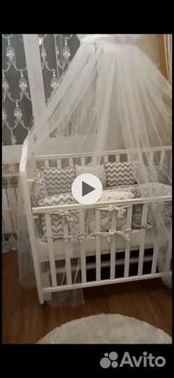 Детская кроватка с продольным маятником