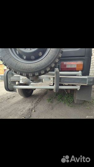 Крепление запасного колеса на Ниву