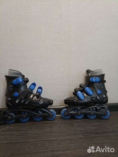 Роликовые коньки
