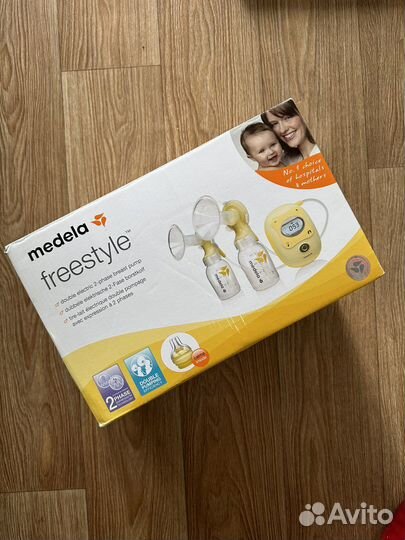 Молокоотсос электрический двойной medela