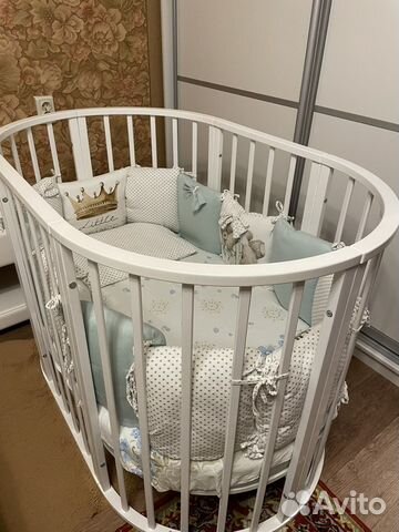 Детская кроватка с маятником круглая