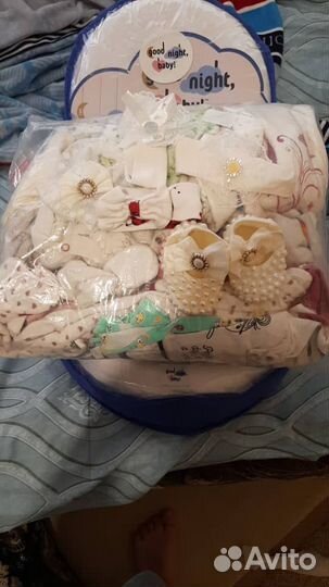 Кокон и вещи для новорожденных
