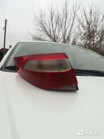 Левый задний фонарь на киа рио 3