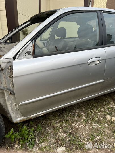 Передняя левая дверь киа спектра