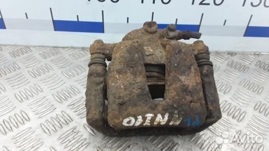 Суппорт тормозной передний левый opel corsa D (NNI